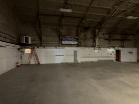 Second warehouse bay with open floor area
